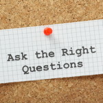 Ask The Right Questions on a cork notice board