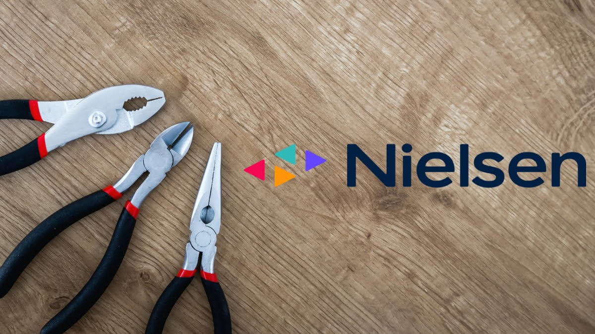 A photo of hand tools and the Nielsen logo