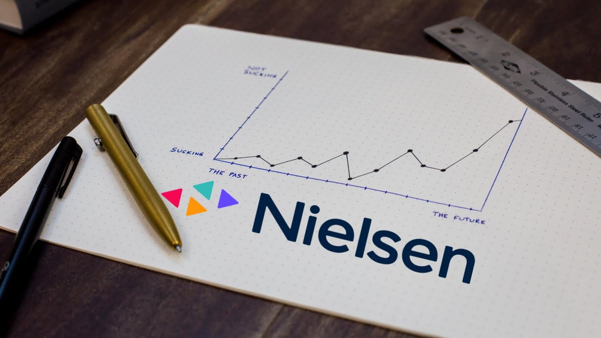 A photo of a line graph and the Nielsen logo