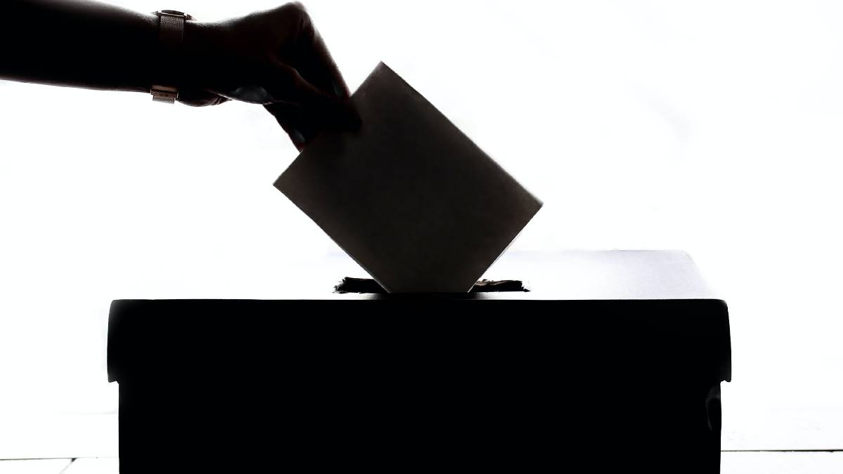 A photo of a ballot being cast.