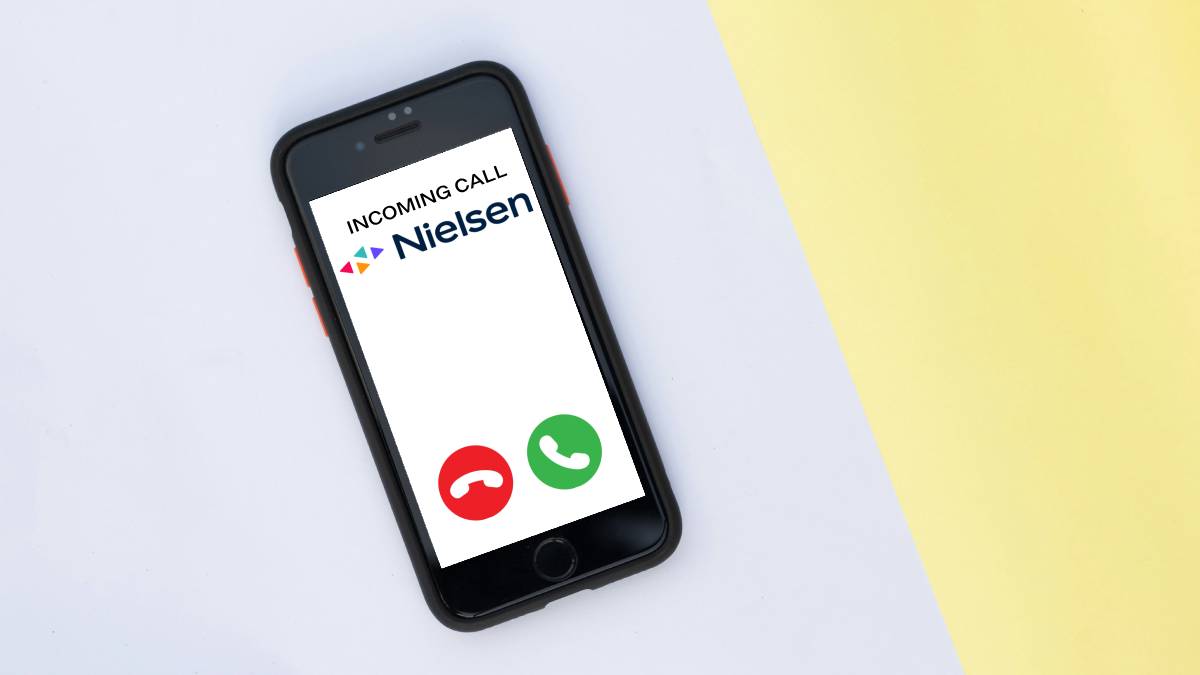 A photo of an iPhone receiving an incoming call from Nielsen