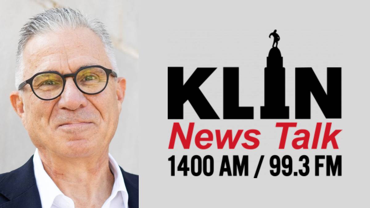 A photo of Dan Parsons and the KLIN logo