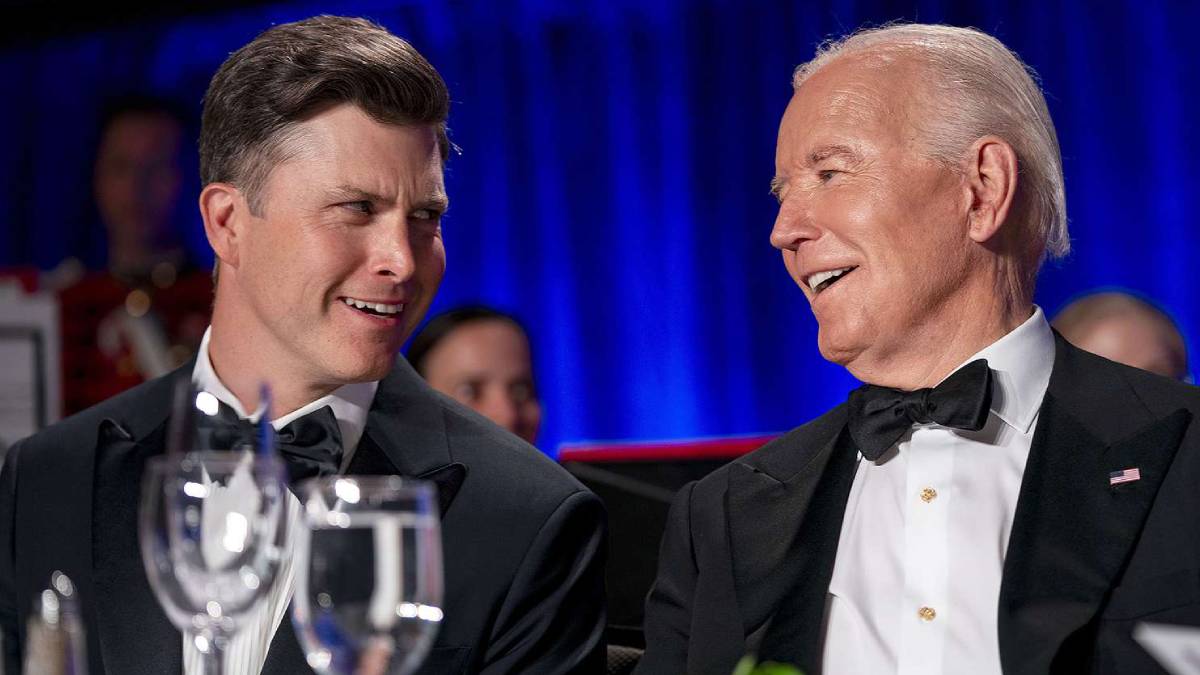 A photo of Colin Jost and President Joe Biden