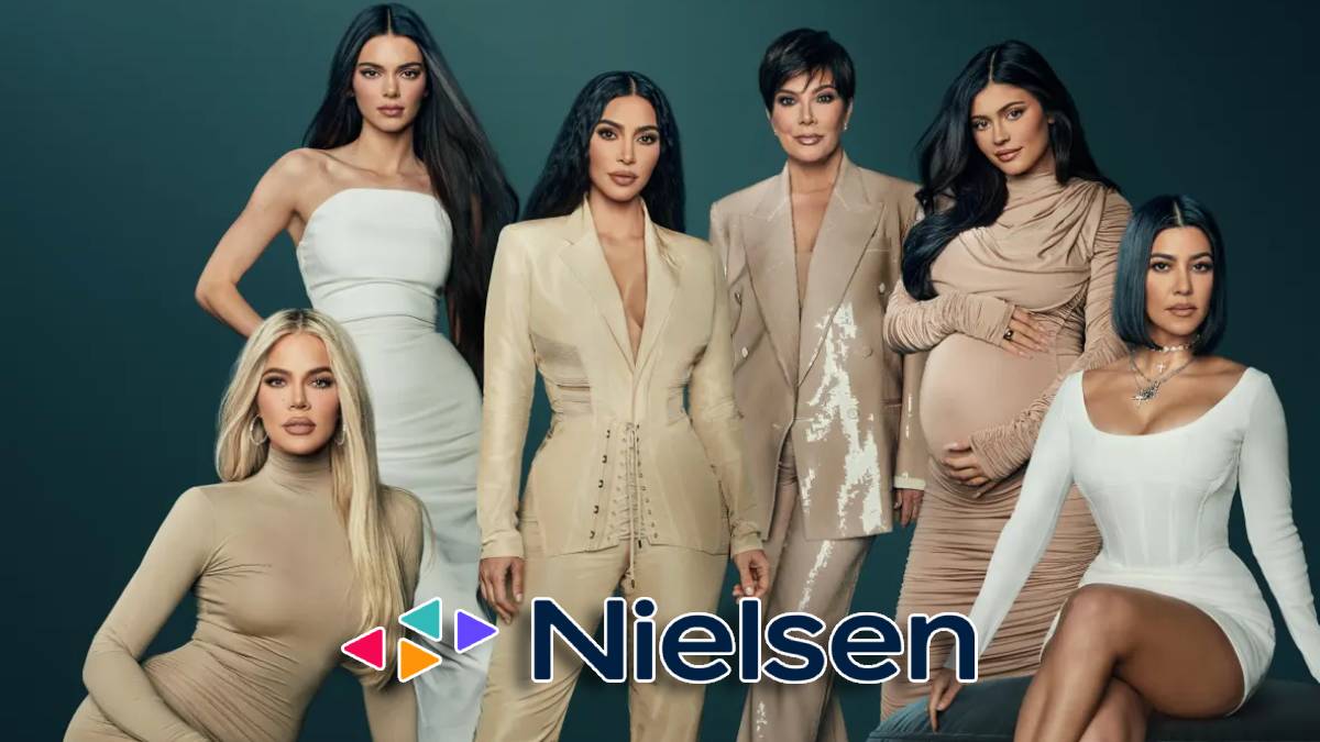 A photo of the Kardashians and the Nielsen logo