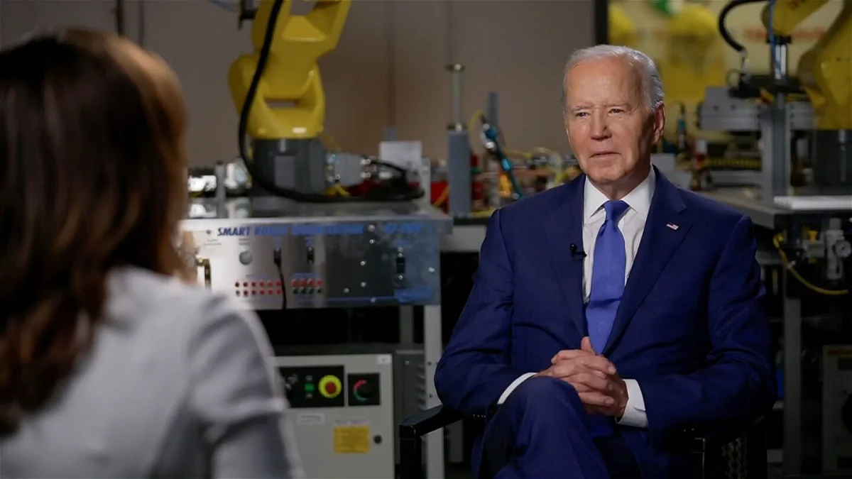 A photo of Erin Burnett interviewing Joe Biden