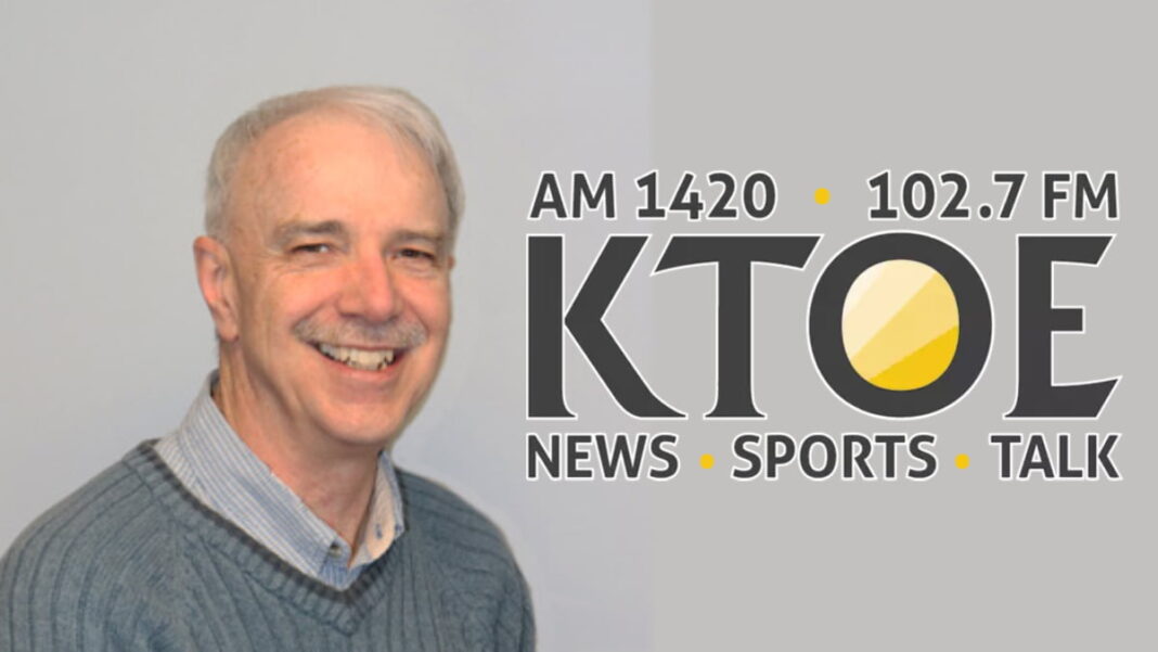 A photo of Mike Sullivan and the KTOE logo