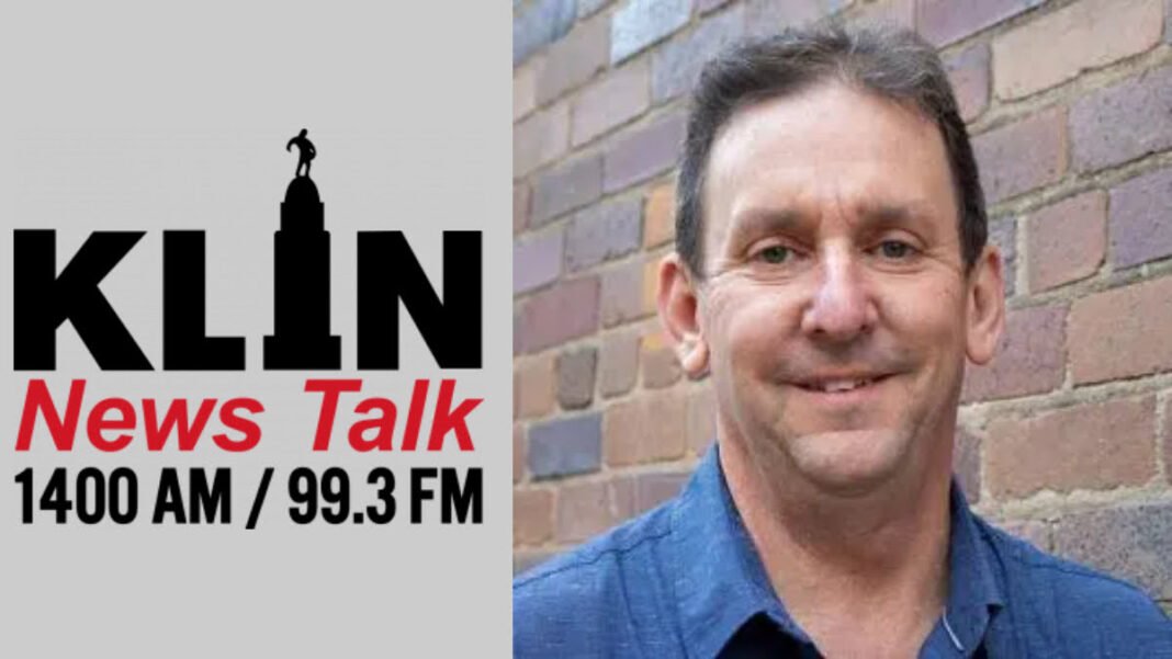 A photo of Tom Stanton and the KLIN logo