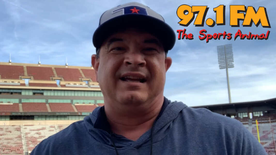 A photo of Erik Gee and the 97.1 The Sports Animal logo