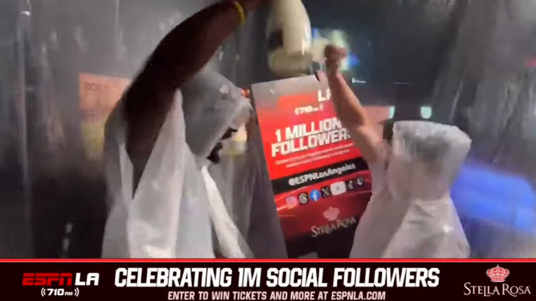 A photo of ESPN LA 710 celebrating 1 million social followers