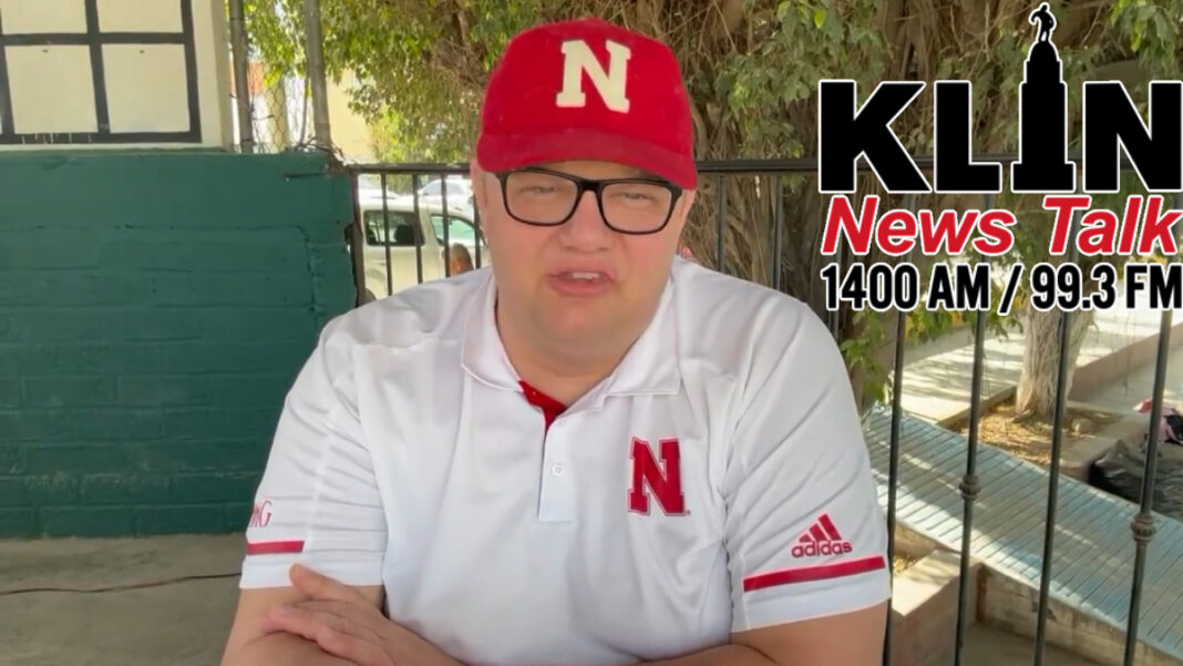 A photo of Nate Rohr and the 1400 KLIN logo