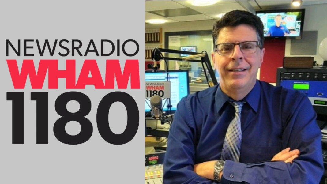 A photo of Todd Hallidy and the WHAM 1180 logo