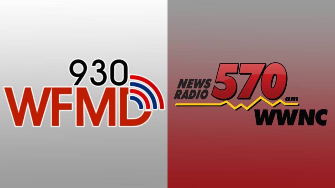 A photo of the 930 WFMD and 570 WWNC logos