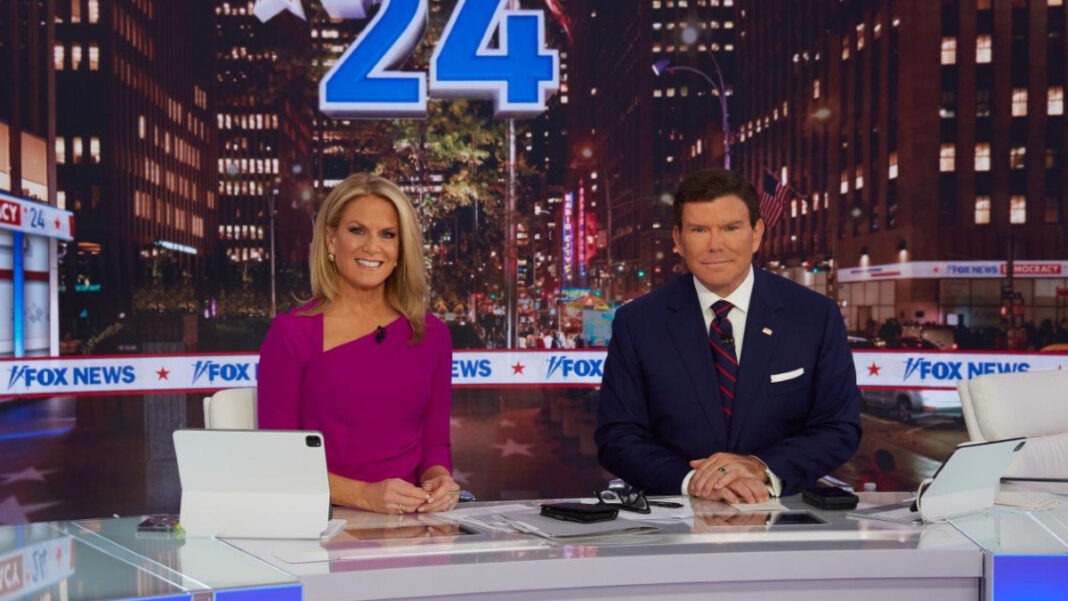 A photo of Bret Baier and Martha MacCallum at the Fox News desk