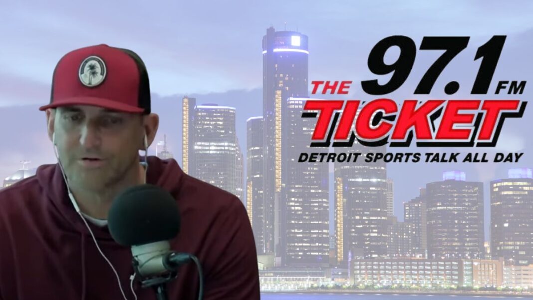 Screengrab of Doug Karsch and a logo for 97.1 The Ticket in Detroit