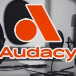 Audacy Logo (Canva | Social Screenshots)